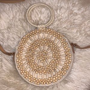 “A New Day” round beaded braided rope purse